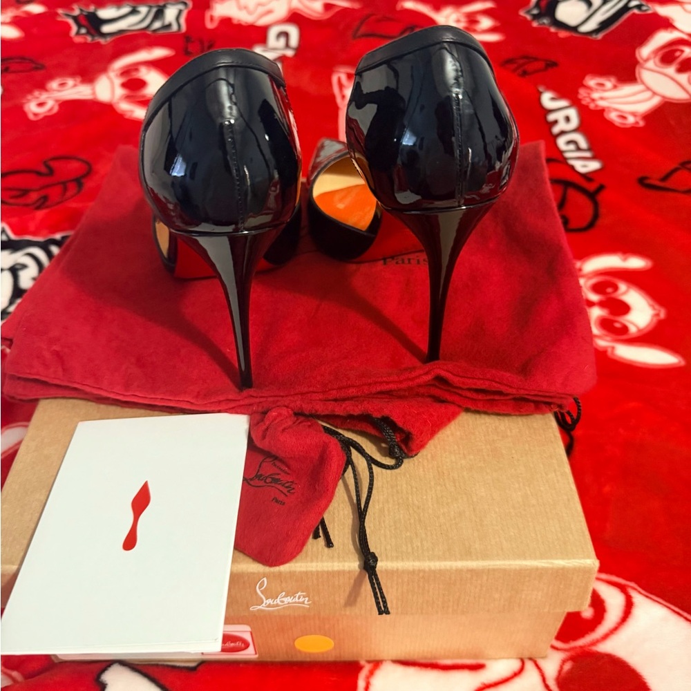 Christian Louboutin Patent Black Heels with Signature Red Soles - Picture 6 of 7